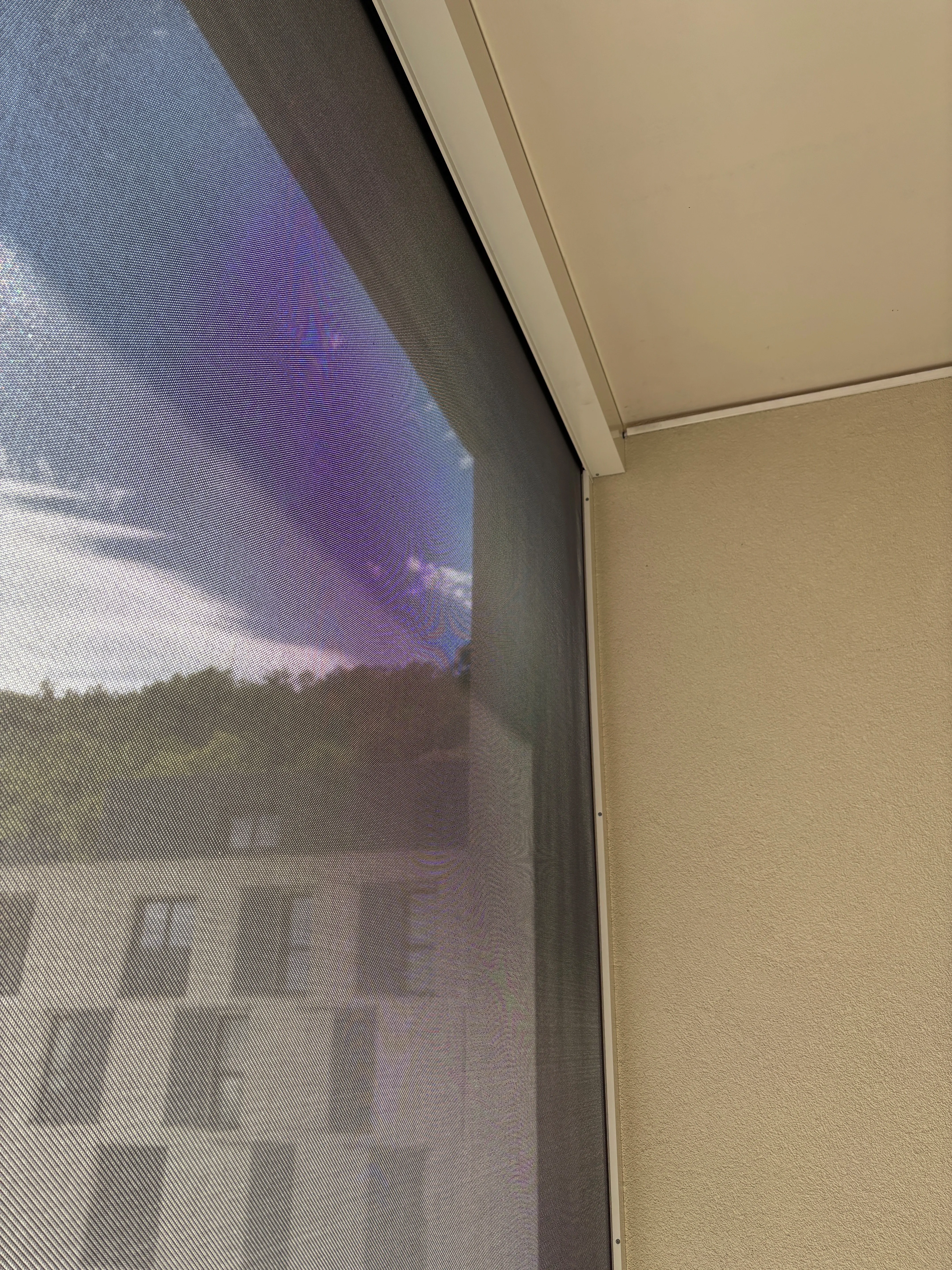 store vertical ZIP balcon immeuble