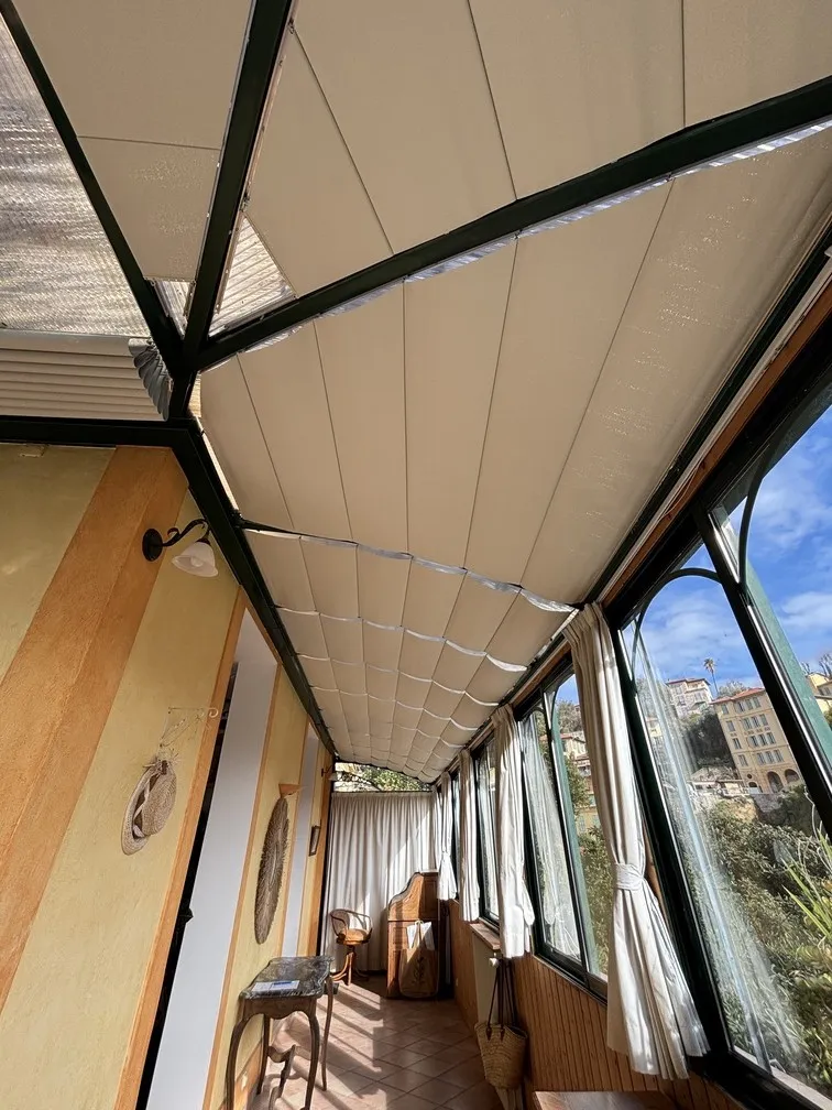 store triangle véranda